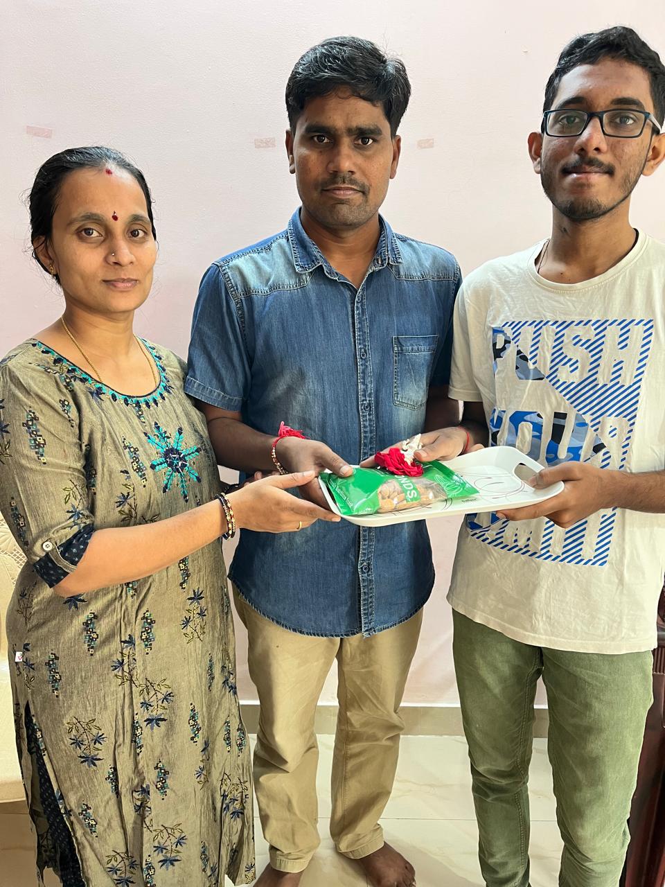 R K Shishir presenting Guru Dkshina to Dr Ramu